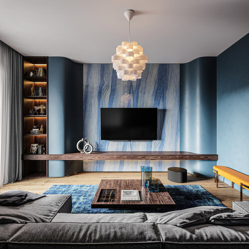 Loewe klang sub1 – kompakter Subwoofer im modernen blauen Wohnzimmer mit Loewe Fernseher