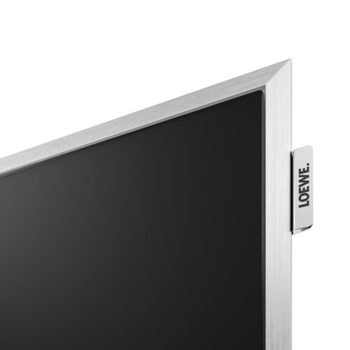 Loewe stellar 65 dr+ concrete OLED TV Rahmen mit Loewe Logo– Premium Fernseher mit echter Betonrückwand und hochwertiger Verarbeitung